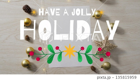 Have jolly holiday text image over Christmas decorations on wooden background Have jolly holiday text image over Christmas decorations on wooden background 135815959