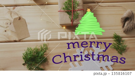 Image of merry christmas text over christmas presents Image of merry christmas text over christmas presents 135816107