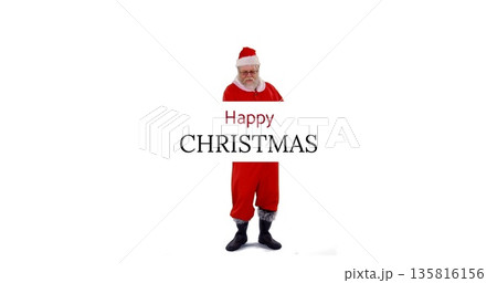 Santa Claus in festive outfit spreading holiday cheer with Happy Christmas message 135816156