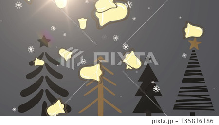 Image of snow falling over christmas trees and decorations 135816186