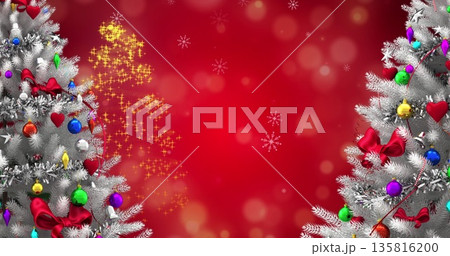 Image of snow falling over christmas trees and decorations 135816200