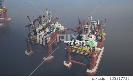 Drone shot top down view of drilling oil ships at sea ready for fossil fuel extraction. Massive oil rig platforms used for tapping petroleum deposits from ocean water reserves to supply global energy 135817723
