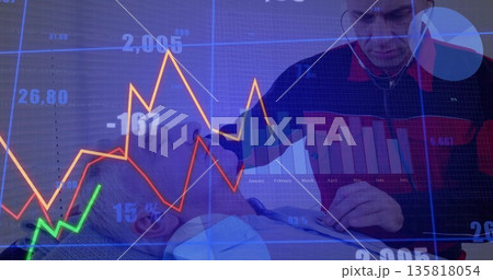 Caregiver in dark uniform examining patient on clinic table with stethoscope and data overlay 135818054