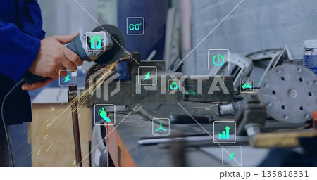 Metalworker hands grinding steel with angle grinder in machine shop, with digital icons, copy space Metalworker hands grinding steel with angle grinder in machine shop, with digital icons, copy space 135818331
