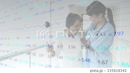 Nurse in blue scrubs supporting senior woman walking rehab corridor, holding rail with data overlay 135818342