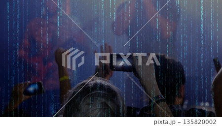 Holding smartphone horizontally, fan capturing stage code visuals at concert venue, with wristbands Holding smartphone horizontally, fan capturing stage code visuals at concert venue, with wristbands 135820002