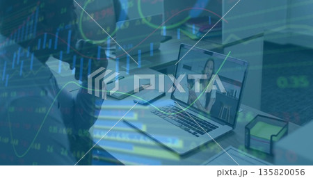 Holding smartphone, manager joining call at office with laptop, notebook, market charts, copy space 135820056