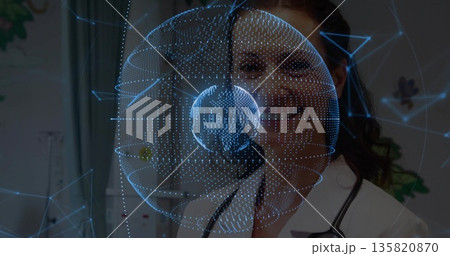 Medical doctor projecting 3D globe in clinic, with white lab coat, stethoscope, cabinet and chart Medical doctor projecting 3D globe in clinic, with white lab coat, stethoscope, cabinet and chart 135820870