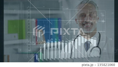 Smiling doctor in lab coat, stethoscope showing data overlay over office binder shelves, copy space 135821060