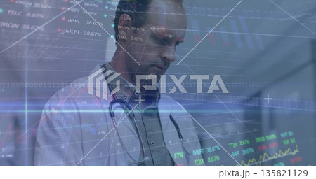 Doctor wearing lab coat and stethoscope viewing stock tickers on hologram in hospital corridor Doctor wearing lab coat and stethoscope viewing stock tickers on hologram in hospital corridor 135821129