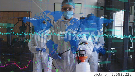 Operating female laboratory technician spraying disinfectant in lab, with data overlay 135821226
