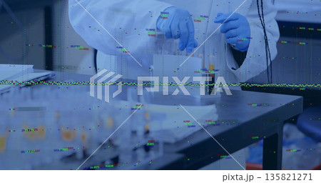 Researcher wearing lab coat and gloves holding test tube on metal lab bench, with glitch artifacts 135821271
