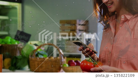 Scanning shopper in pink shirt shooting tomatoes with phone at stall, digital overlay, copy space Scanning shopper in pink shirt shooting tomatoes with phone at stall, digital overlay, copy space 135822109