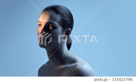Male portrait in soft blue studio light on clean background. Male portrait in soft blue studio light on clean background. 135823796