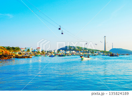 Cable car in Phu Quoc Island, Vietnam tourist area. Scenic view of waterfront village, Cable car in Phu Quoc Island, Vietnam tourist area. Scenic view of waterfront village, 135824189