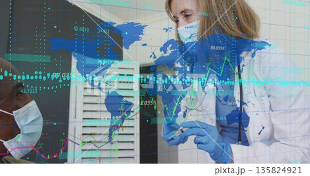 Presenting female doctor holding syringe in clinic, wearing mask, stethoscope and blue gloves 135824921