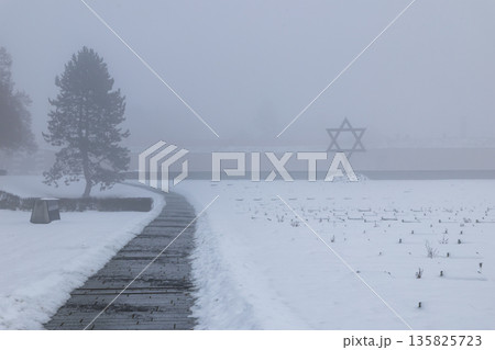 Holocaust memorial Terezin during a winter fog Holocaust memorial Terezin during a winter fog 135825723
