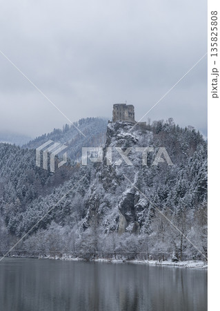 Strecno Castle ruins overlooking Vah river in winter Strecno Castle ruins overlooking Vah river in winter 135825808