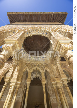 Ornate Arabic architecture decorating the Alhambra palace in Granada, Spain Ornate Arabic architecture decorating the Alhambra palace in Granada, Spain 135825978