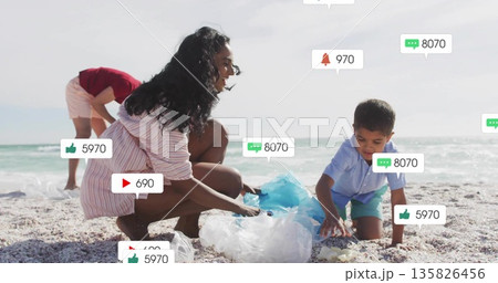 Cleaning mom and kids gathering plastic debris on sandy beach, with notification icons Cleaning mom and kids gathering plastic debris on sandy beach, with notification icons 135826456
