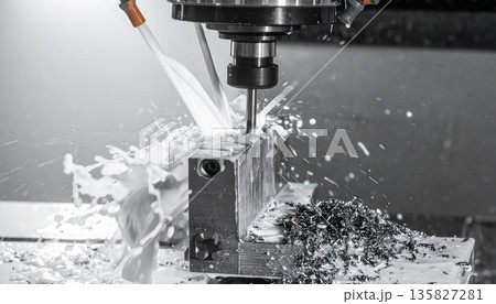 A cinematic shot of a large industrial CNC vertical machining center in operation A cinematic shot of a large industrial CNC vertical machining center in operation 135827281