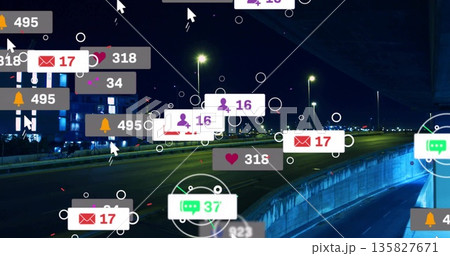 Floating social media notification icons hovering above highway under overpass, lights, barrier 135827671