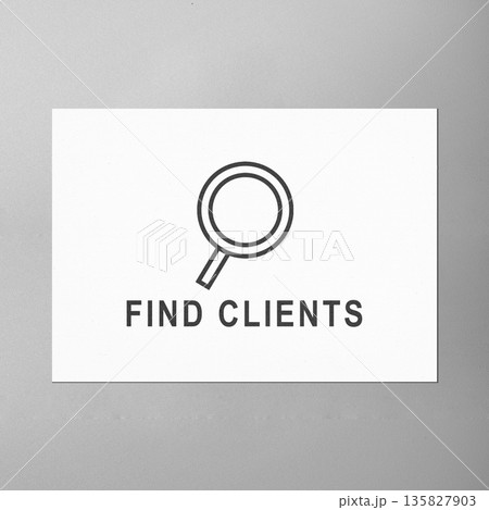 A clean, minimalist business concept featuring a white card with a magnifying glass icon and the text 'FIND CLIENTS' in bold capital letters, set against a grey background 135827903