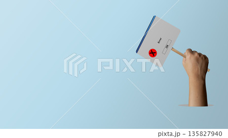 A hand holding up a sign designed like a computer system error pop-up window with an OK button and red cross icon, set against a clean blue background with copy space A hand holding up a sign designed like a computer system error pop-up window with an OK button and red cross icon, set against a clean blue background with copy space 135827940