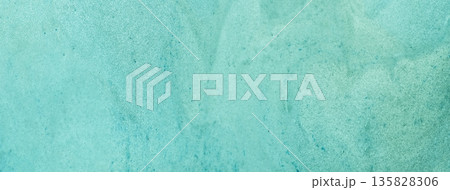 Light teal abstract fluid art background with soft marble texture and cyan acrylic pour painting style, macro 135828306