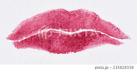 Textured imprint of female lips with bright pink lipstick, detailed skin microrelief 135828339