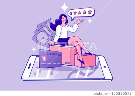 Happy woman sitting on delivery boxes with smartphone and credit card. 135830572
