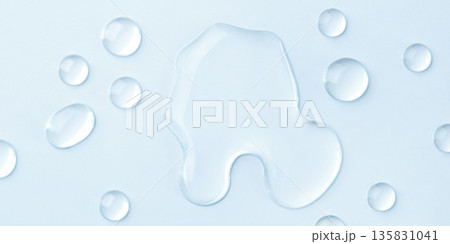 Drops of cosmetics on a blue background 135831041