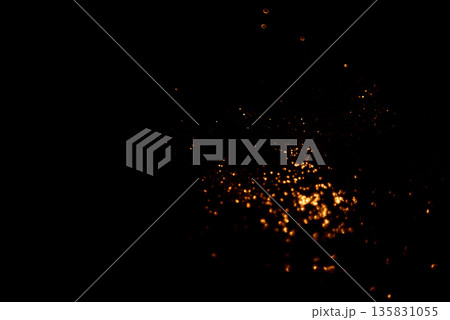 Golden abstract bokeh on black background. 135831055