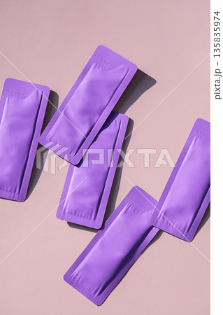 Purple sachets for cosmetic product. Purple sachets for cosmetic product. 135835974
