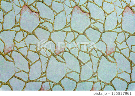 White fabric with gold cell pattern and pink gradient spots 135837961