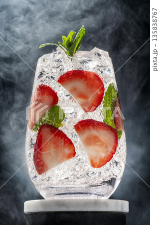 Strawberry Mint Gin Tonic in Glass Strawberry Mint Gin Tonic in Glass 135838767