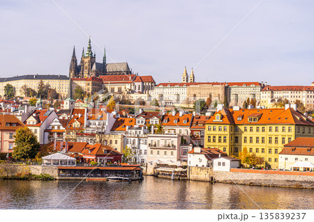 Prague Vltava water River in Czechia from Charles Bridge Praha Castle Old Town roofs 135839237