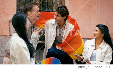 Friends celebrating gay pride and LGBTQ plus community 135839801