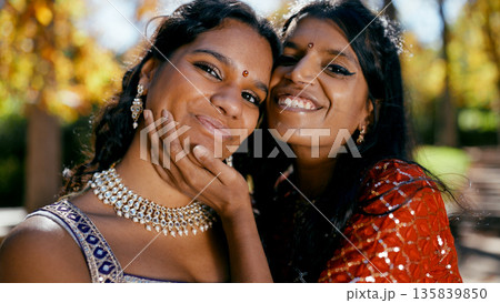 Indian women smiling together showing friendship and tradition 135839850
