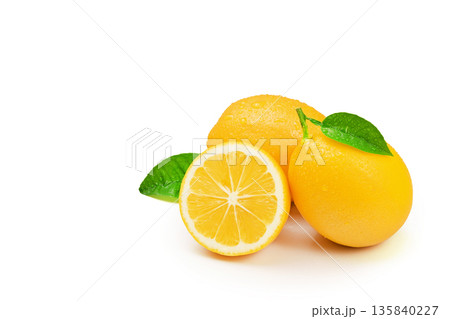 Three lemons with a leaf on top Three lemons with a leaf on top 135840227