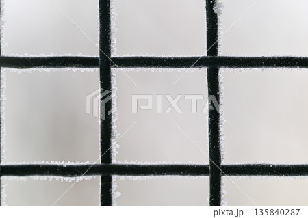 A frosted window with black lines 135840287