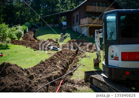 Excavation and installation of underground manhole system. 135840828