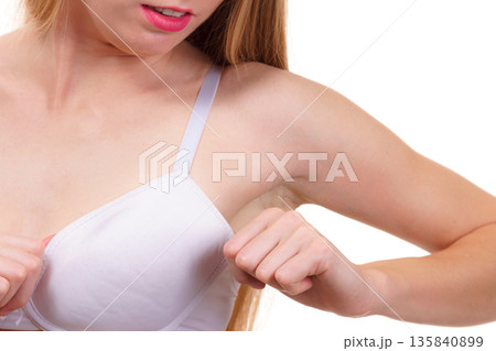 Female wearing too big bra Female wearing too big bra 135840899