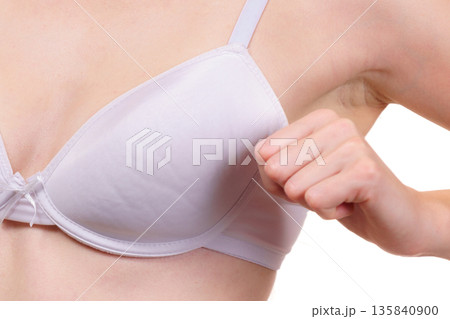 Female wearing too big bra 135840900