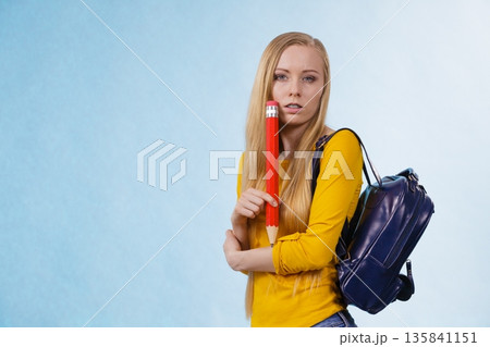 Young woman going to school Young woman going to school 135841151