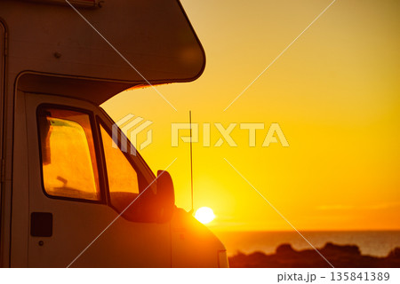 Caravan on beach at sunrise 135841389