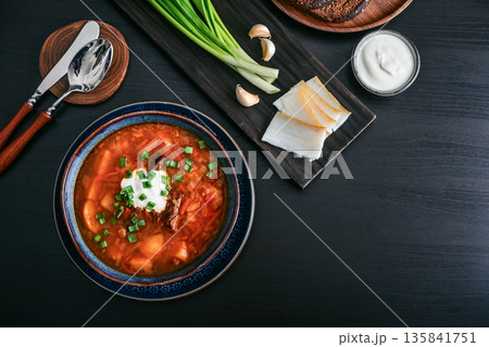 Bowl of red beetroot soup borscht with white cream Bowl of red beetroot soup borscht with white cream 135841751