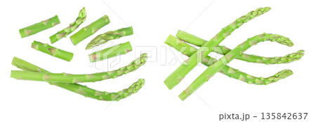 Fresh sprouts of asparagus isolated on white background. Top view. Flat lay Fresh sprouts of asparagus isolated on white background. Top view. Flat lay 135842637