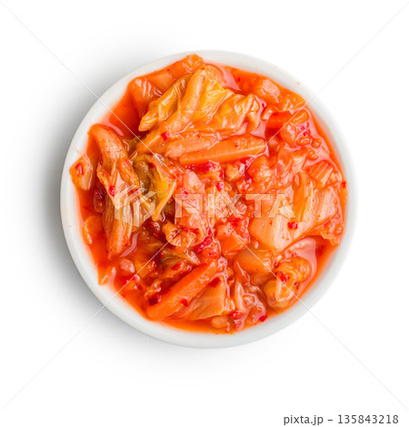 Fermented cabbage. Kimchi. Korean food in bowl isolated on white background. 135843218