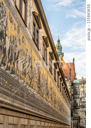 A large mural The Procession of Princes shows the mounted rulers of Saxony in Dresden. The artwork stretches along a wall, capturing historical figures in a procession 135843638